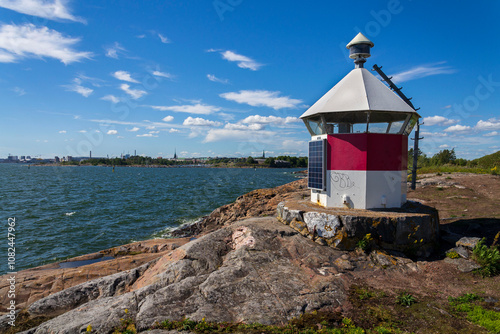 Lighthouse on islands of Suomenlinna sea fortress southest form Helsinki city center, Finland, sunny summer day, UNESCO World Heritage Site photo