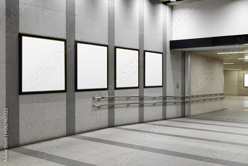 Obraz na płótnie Four squares blank billboard advertising poster on a subway station hall. Space for text for advertising signage ideas for mockup w salonie