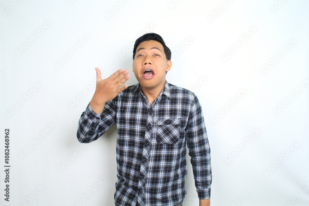 Fototapeta premium allergic asian man sneezing suffering flu and virus diseas isolated on white wearing casual shirt