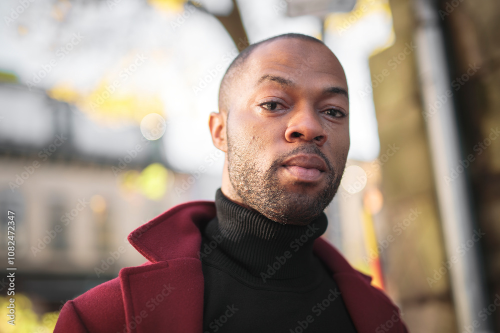 Fashion portrait of black man in city in modern spring or fall season outfit. Fashion portrait of black man in city in modern spring or fall season outfit.