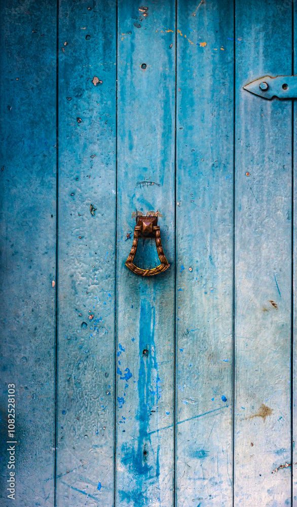 Detail of old wooden door of a house in Brazi. Detail of old wooden door of a house in Brazi.