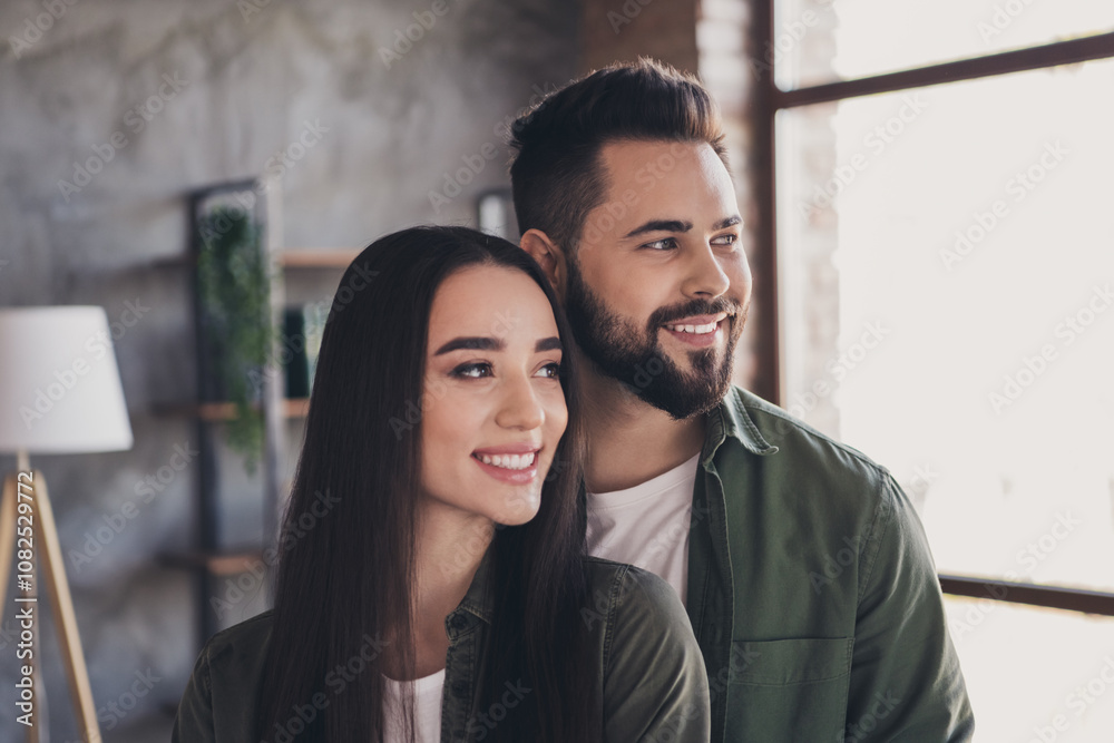 Photo of two young attractive loving people buy rent flat modern loft interior indoors living together Photo of two young attractive loving people buy rent flat modern loft interior indoors living together