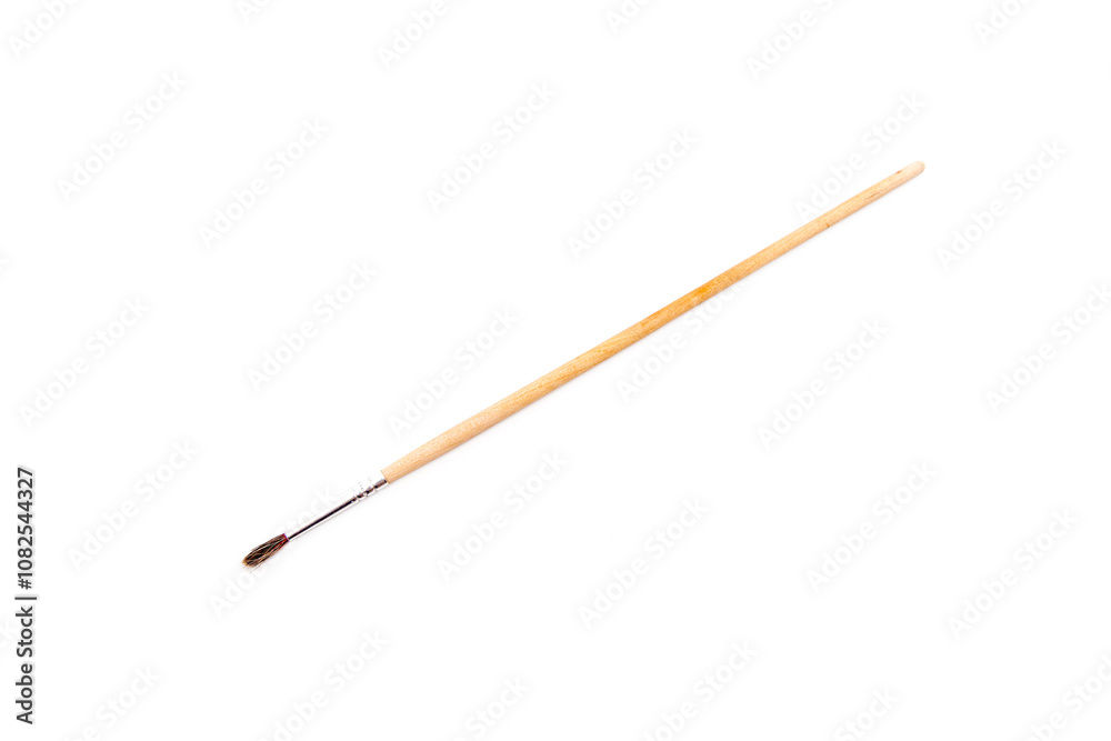 a small, thin, natural paint brush. a small, thin, natural paint brush.