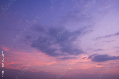 a purple and pink sky with a purple and purple sunset
