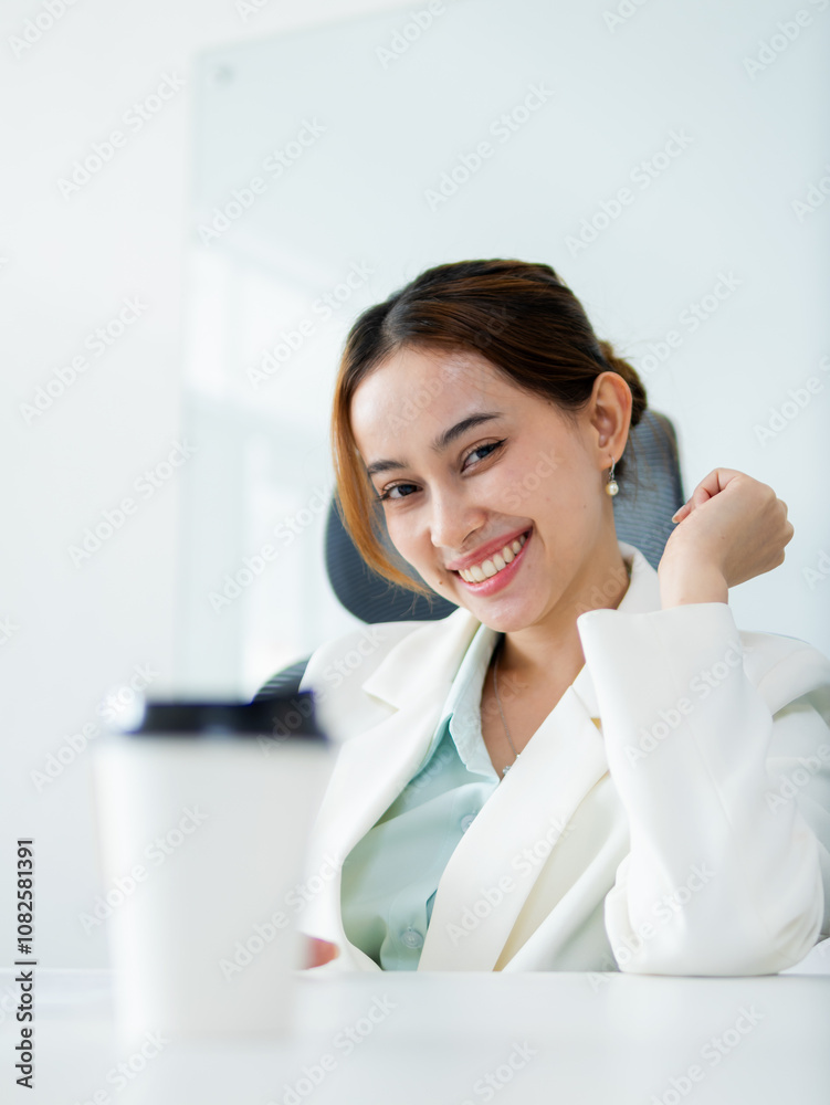 Professional woman smiling office setting portrait bright environment confident viewpoint positive vibes Professional woman smiling office setting portrait bright environment confident viewpoint positive vibes