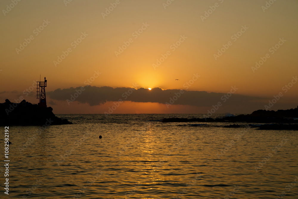 Sunrise Reflection at Muam Port
