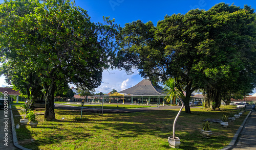 Lush Greenery Surrounding the Royal Palace, Serene Courtyard of the Mangkunegaran Palace photo