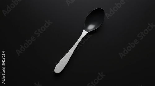 Minimalist 3D model of a lone spoon in dark space