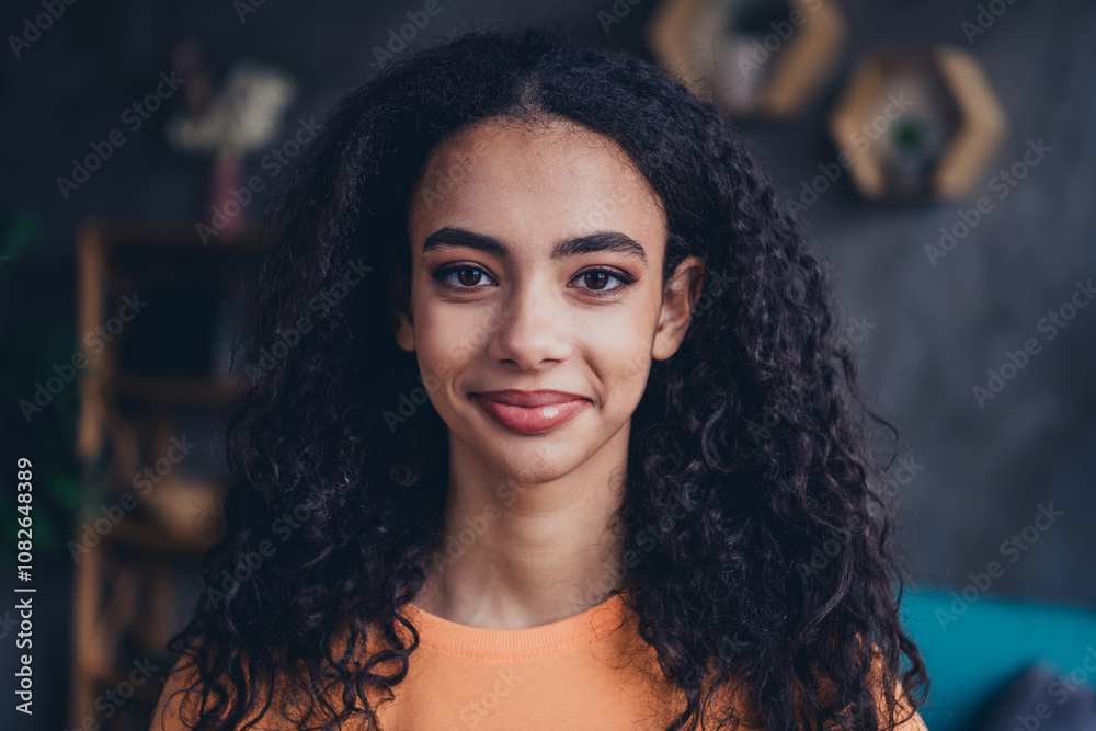 Young afro-american student smiling confidently indoors at home, embodying modern education lifestyle Young afro-american student smiling confidently indoors at home, embodying modern education lifestyle
