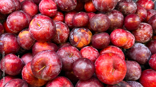 Red plums or ciruelas.