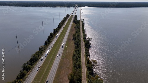 Traveling across America on interstate highway I-95 crossing Lake Marion, SC cars and trucks shipping and transportation photo