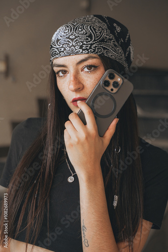 portrait of young woman talking on the phone