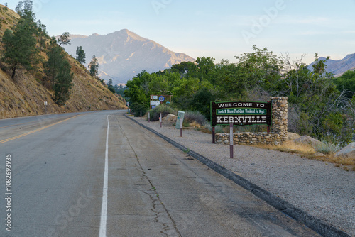 Welcome to Kernville sign on the road with mountains in the background.
