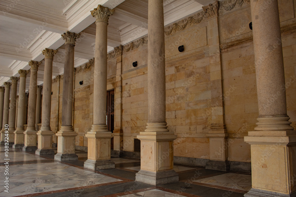 Fototapeta premium Thermal spring in an arched colonnade, in Karlovy Vary, in the Czech Republic