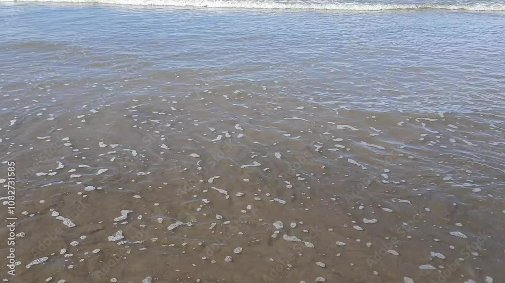 Calm Ocean Waves at Pariaman Beach, Indonesia Calm Ocean Waves at Pariaman Beach, Indonesia
