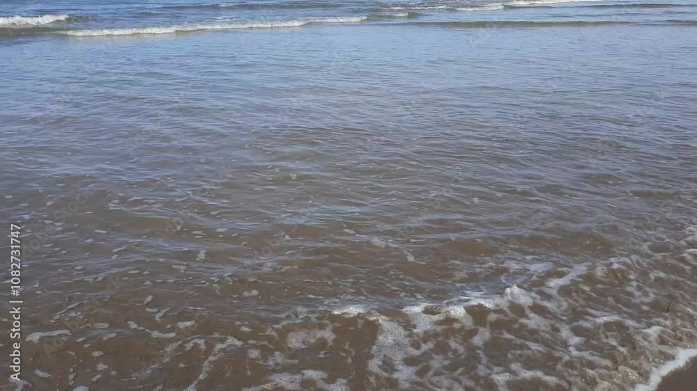 Calm Ocean Waves at Pariaman Beach, Indonesia Calm Ocean Waves at Pariaman Beach, Indonesia
