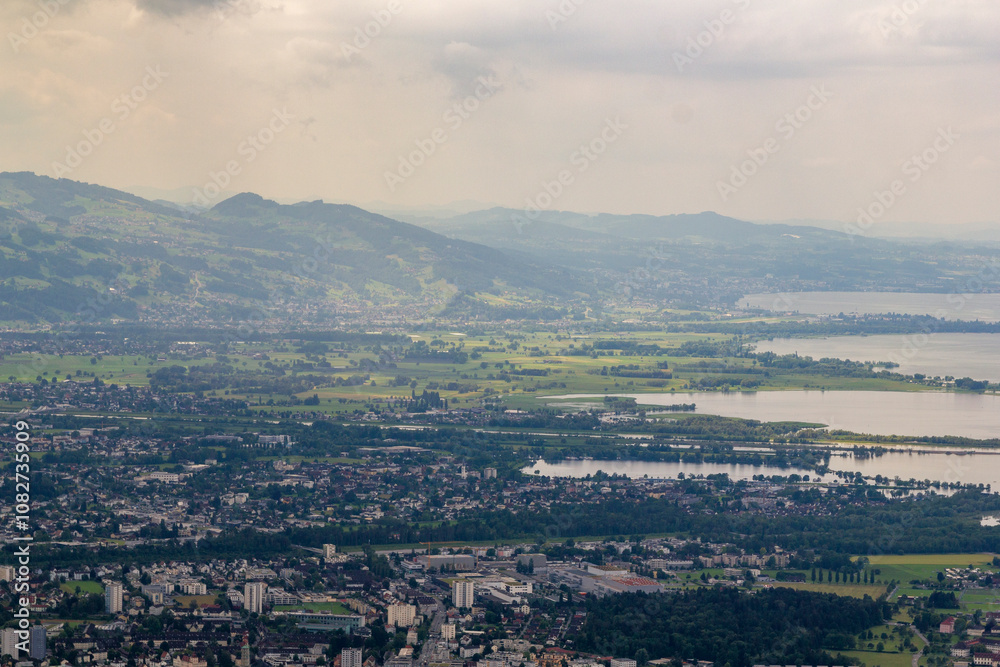 Look into the Valley of Bregenz with the famous Bodensee in the background at a cloudy summer day. Look into the Valley of Bregenz with the famous Bodensee in the background at a cloudy summer day.