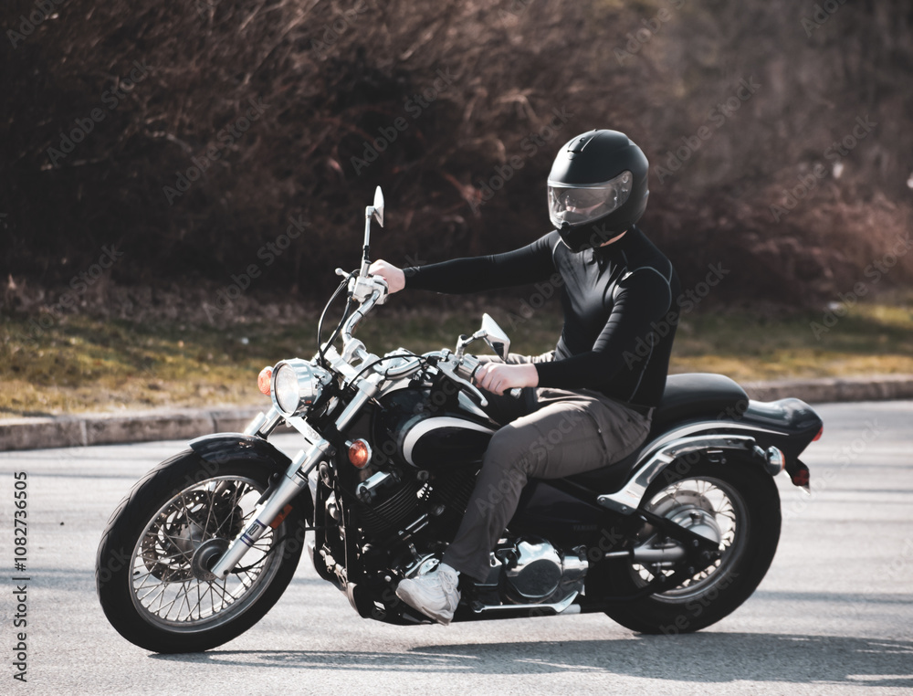 Fototapeta premium A man riding a motorcycle