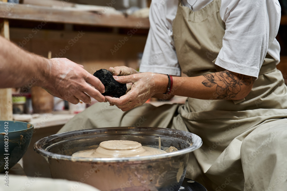 custom made wallpaper toronto digitalHands expertly shape clay on a spinning wheel while an artist guides the process.