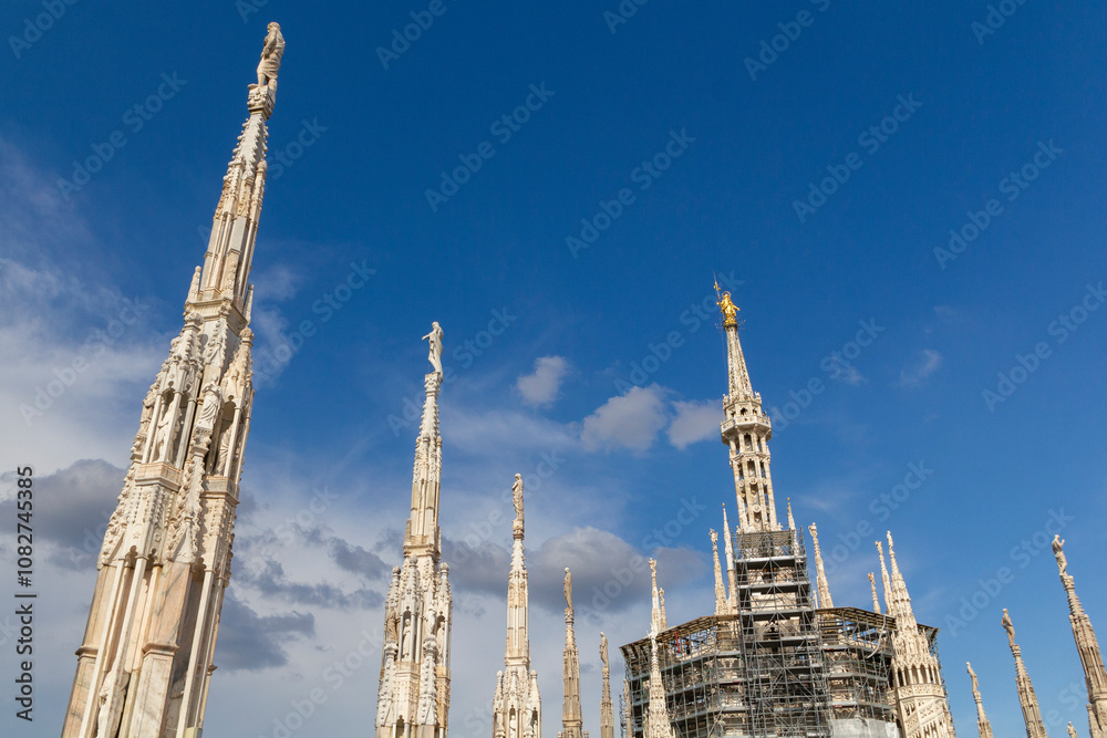 the world famous and unique milan cathedral called Duomo di Milano with the countless sculptures and countless little towers the world famous and unique milan cathedral called Duomo di Milano with the countless sculptures and countless little towers