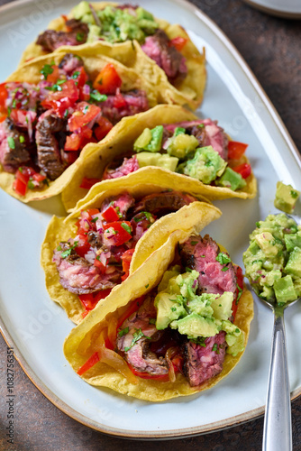 Skirt steak tacos with corn tortillas