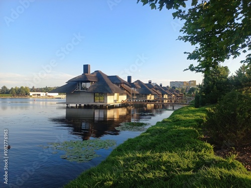 Hotel houses on the water on the riverbank