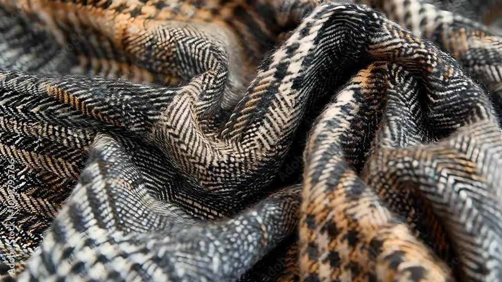 This close-up photograph shows a crumpled plaid fabric with a detailed pattern. The warm colors and textile texture make it suitable for backgrounds, fashion, and design projects. Generative AI This close-up photograph shows a crumpled plaid fabric with a detailed pattern. The warm colors and textile texture make it suitable for backgrounds, fashion, and design projects. Generative AI