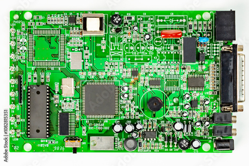 Electronic board with radio components, connectors, slots and processor chip from electronic device isolated on white background. Top view.