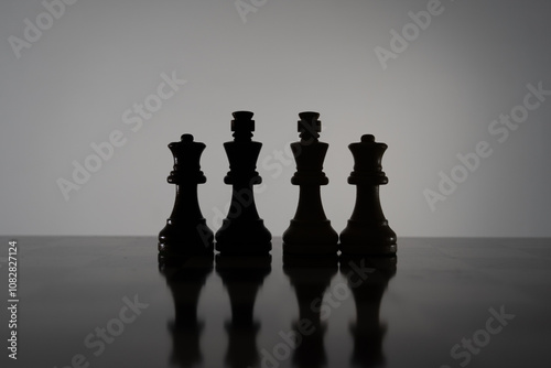 Chess pieces strategically placed on the chessboard symbolize power, vulnerability, and tactical brilliance. The viewer is invited to develop their own associations and create personal interpretations photo