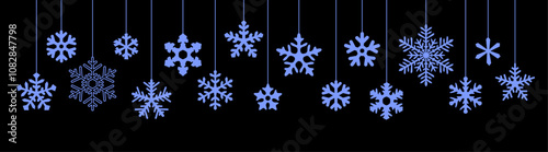 Silhouetted blue snowflake ornaments hanging against a black background, perfect for winter holiday designs and festive digital decor.