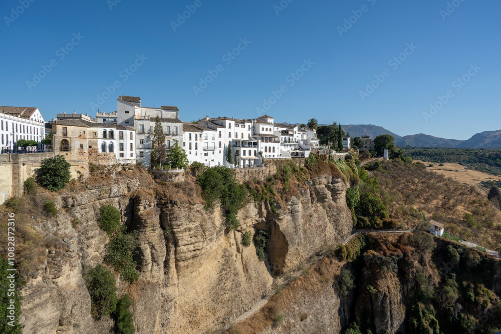 Ronda, Spain - August 19, 2024: Panoramic view and Puente Nuevo in Ronda, Malaga Ronda, Spain - August 19, 2024: Panoramic view and Puente Nuevo in Ronda, Malaga