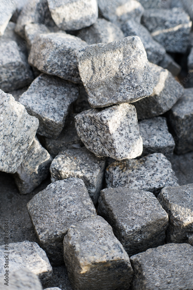 Granite cubes, natural building materials.
Granite cubes, natural building materials.
