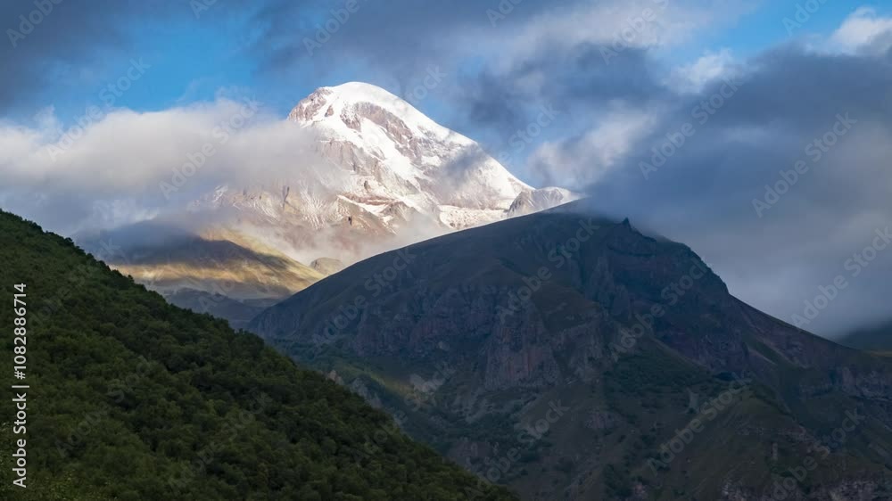 Mount Kazbek in moving clouds time lapse. Mount Kazbek in moving clouds time lapse.