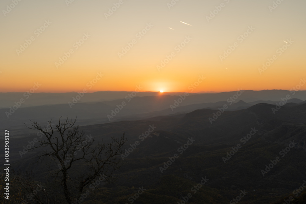 Obraz premium sunset in autumn mountains in georgia