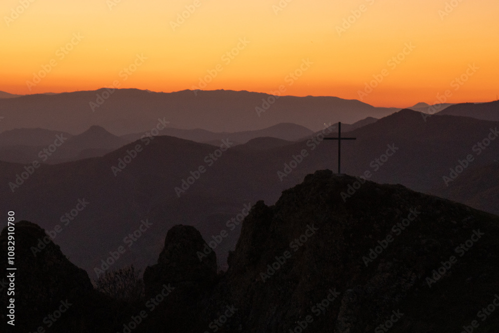 Landscape distant outline of mountains at sunset in Georgia, wallpaper background Landscape distant outline of mountains at sunset in Georgia, wallpaper background