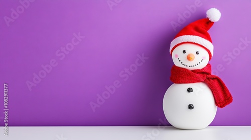 In a snowy landscape, a snowman wears a red hat and scarf, marking the beginning of the winter holidays