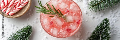 Refreshing holiday cocktail with peppermint and rosemary garnishes amidst fes...