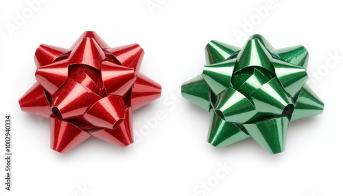 Red and green shiny gift bows isolated on white background.