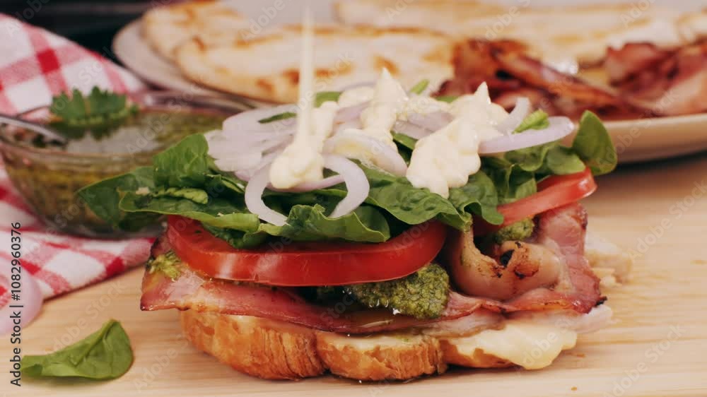 Croissant with jamon ham, Salmon, in Modern Cafe, Top View of Healthy Breakfast in Cafe. English breakfast: fried egg, bacon toast on sandwich. Croissant with jamon ham, Salmon, in Modern Cafe, Top View of Healthy Breakfast in Cafe. English breakfast: fried egg, bacon toast on sandwich.