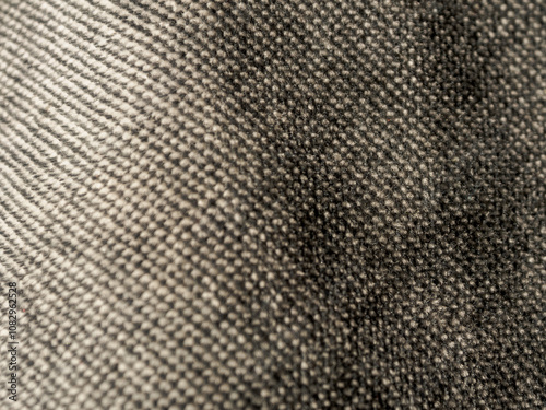 Macro photography of fabric texture, detailing soft waves and patterns, creating an impression of tactile comfort and artistic elegance
