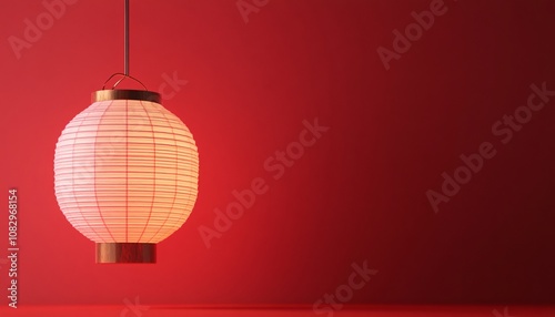 Elegant light pink lantern against a vibrant red backdrop celebrating the festive spirit of Chinese New Year.