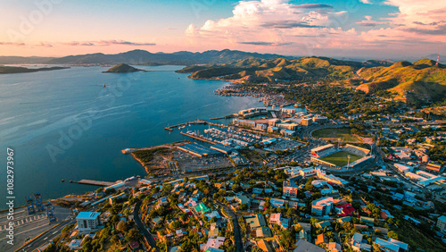 Sunset aerial backdrop of Konedobu Downtown POM clearly shows Tatana Village and looks to Baruni and Gerehu with a beautiful mountainous background photo