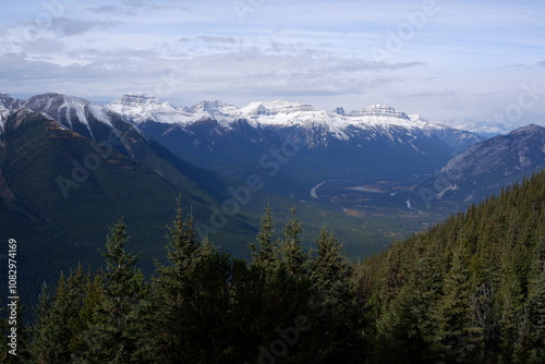 Photo of the Sundance Range with Mount Bourgeau, Mount Brett, Pilot Peak and Mount Temple in Banff National Park in Alberta, Canada.