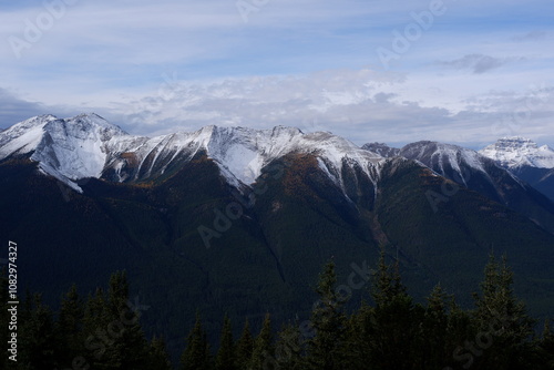Photo of the Sundance Range with Mount Bourgeau, Mount Brett, Pilot Peak and Mount Temple in Banff National Park in Alberta, Canada.