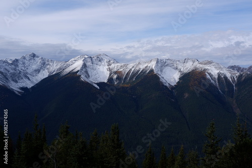 Photo of the Sundance Range with Mount Bourgeau, Mount Brett, Pilot Peak and Mount Temple in Banff National Park in Alberta, Canada.