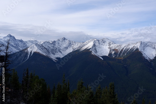 Photo of the Sundance Range with Mount Bourgeau, Mount Brett, Pilot Peak and Mount Temple in Banff National Park in Alberta, Canada.