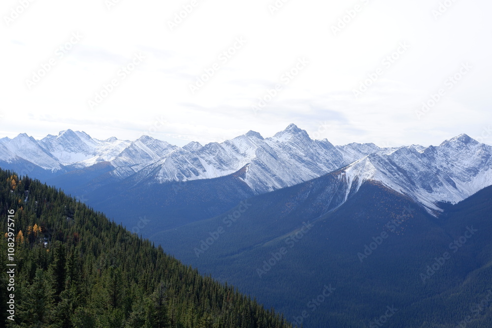 Photo of the Sundance Range with Mount Bourgeau, Mount Brett, Pilot Peak and Mount Temple in Banff National Park in Alberta, Canada. Photo of the Sundance Range with Mount Bourgeau, Mount Brett, Pilot Peak and Mount Temple in Banff National Park in Alberta, Canada.