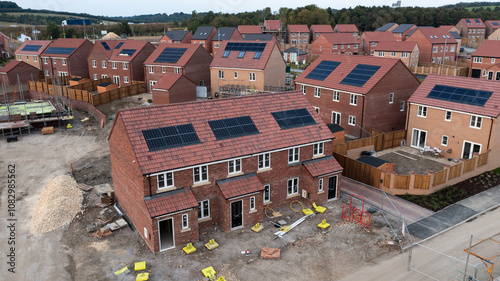 The roof of a new build house with integrated solar panels under construction