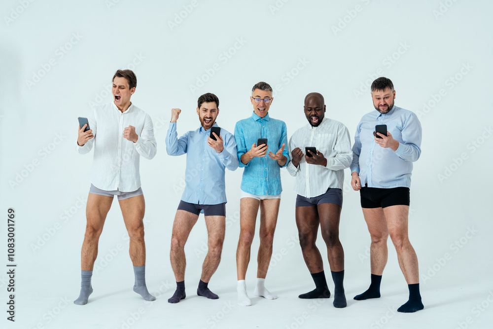 Obraz premium multiethnic men posing for a male edition body positive beauty set. guys with different age, and body wearing boxers underwear and shirt