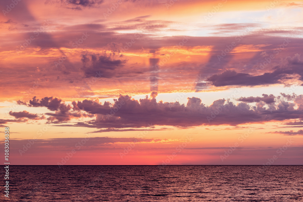 Fototapeta premium Amazing sunset sky above the sea.